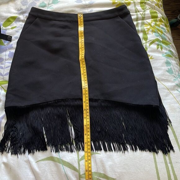 {tl} the letter Black Skirt with bottom fringe/tassels - Picture 10 of 12
